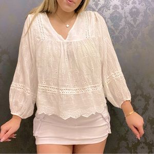 very beachy light weight comfortable white long sleeve floral cut out top